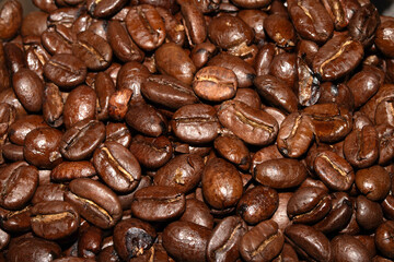 Close up of dark roasted coffee beans deep brown and tasty close up
