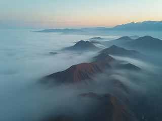 mountains shrouded in clouds, aerial view