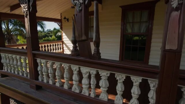 old Queenslander style cottage with corrugated iron roof and verandahs