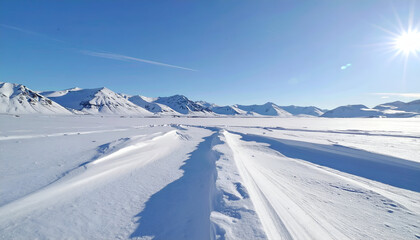 Arctic Landscape Snow Mountains and Blue Sky Serene Winter Scene Travel Destination Scenic Outdoor Adventure White Cold Wilderness Horizon