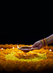 Clay diya lamps lit during diwali celebration, Diwali, or Deepavali, is India's biggest and most important holiday.