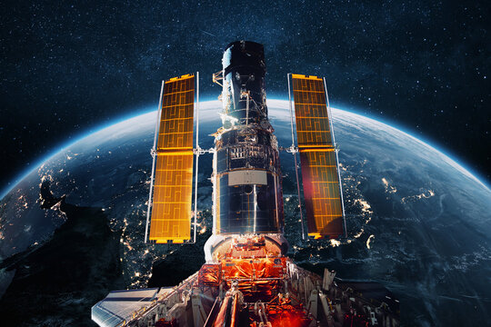 The ISS flies near blue night planet Earth. Space mission and space exploration. Communications and technologies in Earth orbit - Powered by Adobe