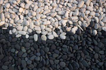 balance of black and white pebbles
