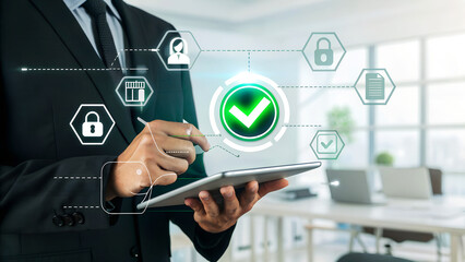Businessman securing data with digital tablet, highlighting cybersecurity, privacy, and network protection for business solutions