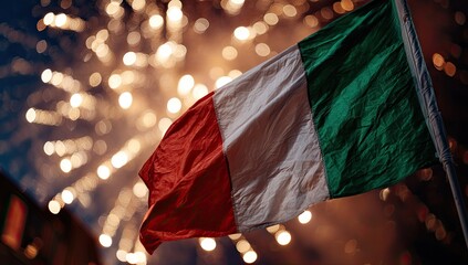 Italian flag waving amidst fireworks