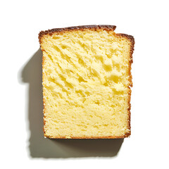 Fototapeta premium A slice of golden pound cake with a dense, moist texture and a slightly browned crust.