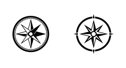 Black and white compass rose navigation symbols side by side