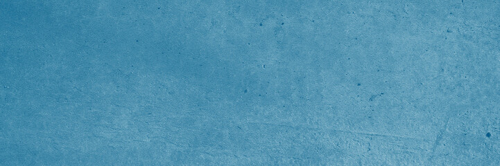 Closeup of a surface with a blue color tone ideal for abstract backgrounds, graphic design projects, or modern print materials.