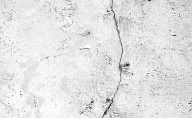 Cracked white wall texture suitable for backgrounds, textures, construction, or decor concepts. Rugged surface adds depth and character.
