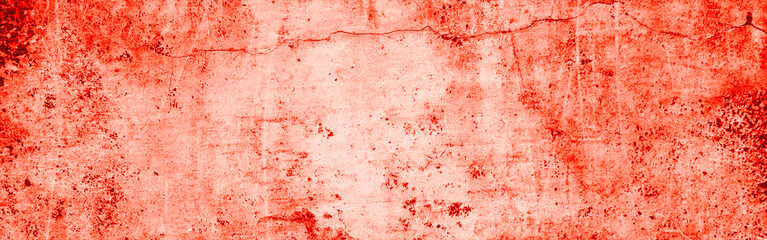 Textured cracked red wall perfect for backgrounds or textures in design projects. Ideal for adding depth or vintage touch.