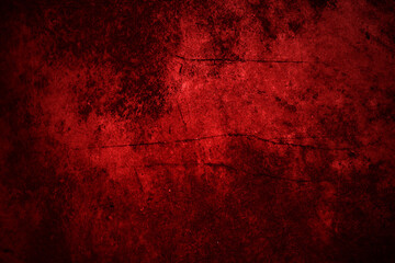 Textured red wall with shadowy edges, suitable for backgrounds, texture backgrounds, design elements, abstract art, or architectural concepts.