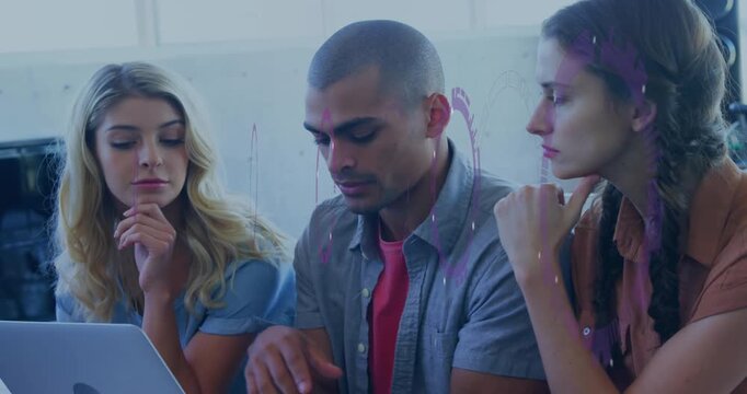 Man opening software on laptop with colleagues watching as graphs pulsing for business analysis