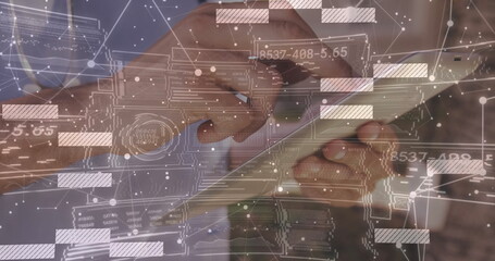 Tapping male technician hands on tablet computer at office workspace, with digital overlay graphics