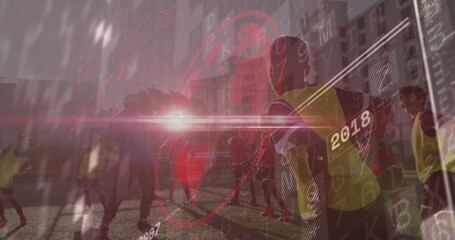 Coach and youth players practicing drills on urban turf field, with yellow bibs and digital overlay