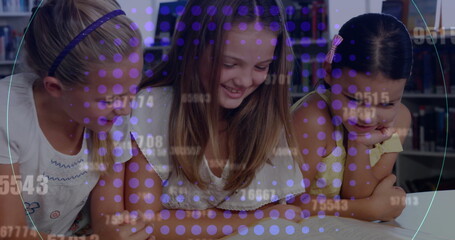 Leaning three girls reading open book at school library, with wooden bookshelves and purple overlay