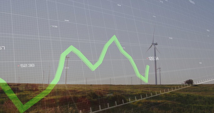 Presenting two turbines standing on hillside, with wire fence, green chart grid overlay, copy space