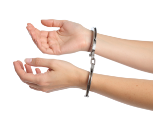 Handcuffed hands with open palms showing restraint and surrender