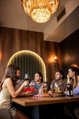 Friends Talking and Smiling at Birthday Celebration