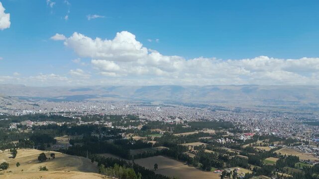 Cinematic aerial shot of Huancayo city in Peru on a beautiful sunny day.