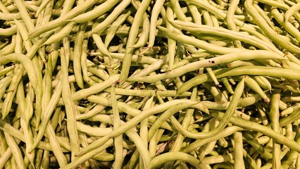 Green beans displayed in a shop for sale