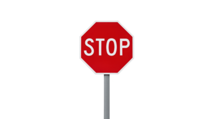 A bright red octagonal stop sign with the word "STOP" in white letters.