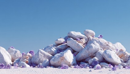 A pastel-toned pile of rocks against a vibrant blue sky