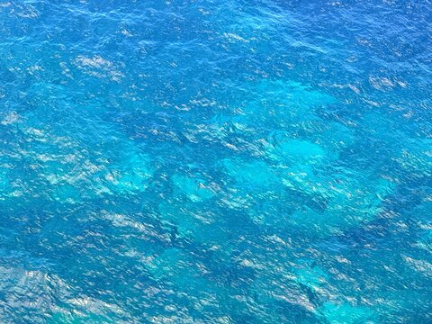 Blue azure sea water background.
