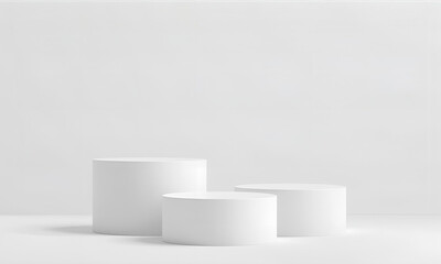 White minimal surface features three cylinder podiums, soft shadows. Use for product staging, branding mockups, and clean, digital design.