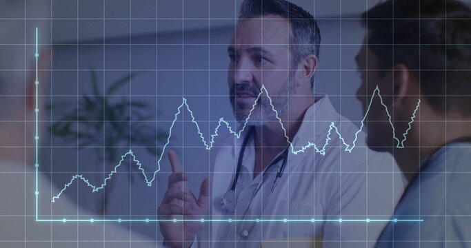 Pointing doctor with stethoscope viewing holographic chart in clinic, with colleague in blue scrubs - Powered by Adobe