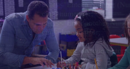 Leaning teacher assisting girls drawing with colored pencils and markers in primary classroom