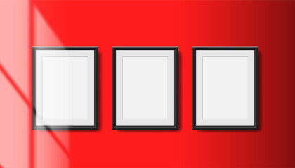 three blank black picture poster frames on the red wall mock up vector illustration