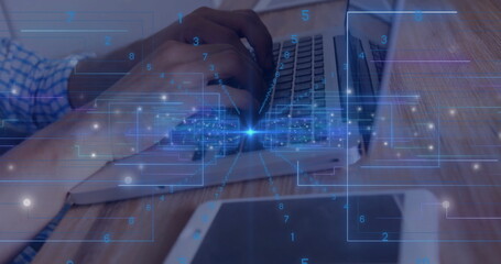 Typing worker's hands streaming data on laptop at office desk, with tablet and digital overlays