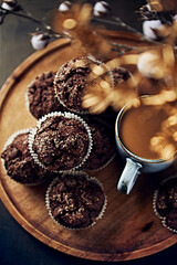 Chocolate muffins for Christmas and u cup of milk coffee