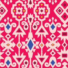 a pink and blue tribal pattern with geometric shapes