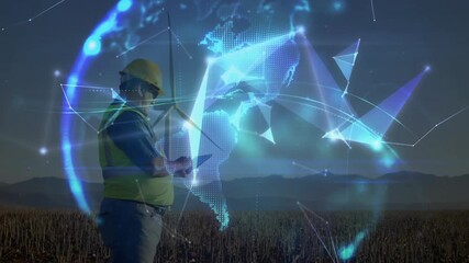 male technician tapping tablet at wind farm activating digital network forming globe around turbine - Powered by Adobe