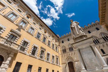 Fototapeta premium Siena, Italy - June 01, 2024: Sallustio Bandini monument. Bottom to top view.