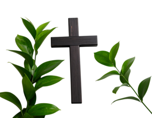 Cross and Greenery on Grey Background - A dark cross rests on a light grey background 