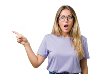 Young woman with glasses expresses shock pointing left against transparent background