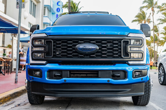 Miami, Florida, USA - April 07, 2025: Car Ford F250 parked outdoor. Blue pickup truck car, front view. 2020 Ford F250 pickup truck car. Blue pickup truck car Ford F250