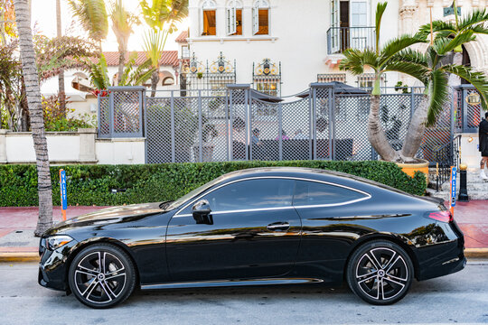 Miami, Florida, USA - April 08, 2025: Black car, side view. 2024 Mercedes Benz CLE 300 coupe car. Luxurious coupe Mercedes Benz 300 4MATIC. Car Mercedes Benz 300 parked outdoor.