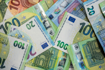 Mixed Euro banknotes background in various values representing cash flow, banking and savings
