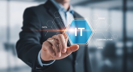 Businessman touching a glowing it hexagon symbol with digital data overlay