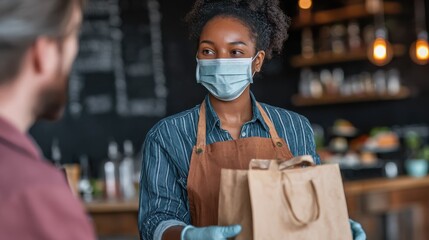 african american female cafe worker wears face mask and gloves giving takeaway food bag to customer mixed race waitress holding takeout order standing in coffee shop restaurant with take away client 