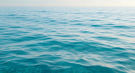 Naklejka premium A calm turquoise ocean with gentle waves under a pale sky on a bright sunny day in summer time ai generated