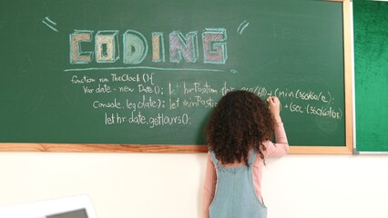 Girl writing engineering prompt by using AI software or programing system to generate AI on table with electronic main board at stem class while student writing software development plan. Pedagogy.