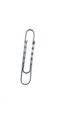 Paper clips on white background with text space