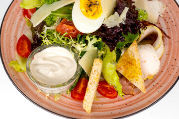 fried egg with bacon and vegetables