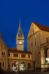 Illuminated cathedral tower at night in Braunschweig, Germany