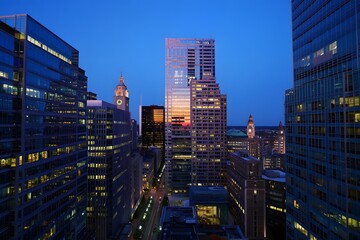 Fototapeta premium Modern City Skyline at Sunset with Skyscrapers