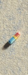 Colorful Capsule on Concrete Surface Background